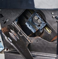 Automatic coffee machine maintenance Automatic coffee machine cleaning. Open door in coffee machine for servicing mechanism. Household appliances maintenance